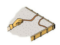 Use a copper pipe that is slightly bent to create a flagstone pattern.
